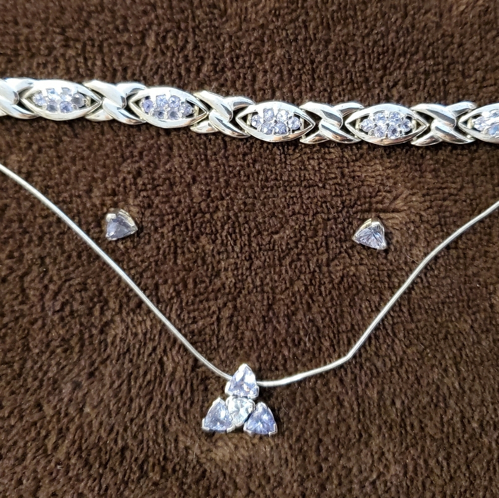 Tanzanite, white gold, white sapphire custom set